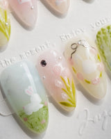 Spring Whisper handmade press-on nails featuring Fresh Picture-book Style, Hand-painted Bunnies, Tulips & Weeping Willows.