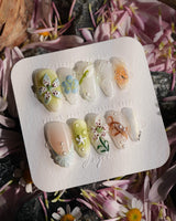 Spring wink nail art close-up showing Fresh Forest Style, 3D Lilies & Butterfly. details
