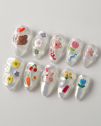 Squishy Pop medium almond nails with cute pop-art accents
