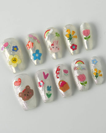 Squishy Pop medium coffin nails with lively decals and reusable press-on finish