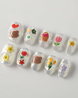 Squishy Pop short oval nails with colorful bubbly summer design