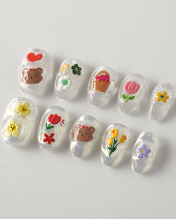 Squishy Pop short oval nails with colorful bubbly summer design