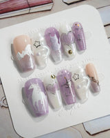 Stargaze pastel cat-eye nails with whimsical sky motifs and raised star accents