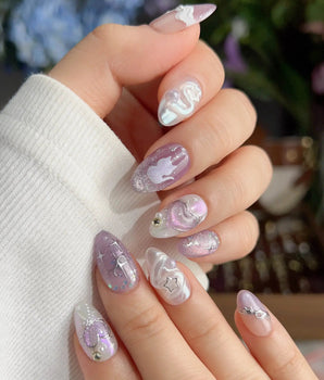 Stargaze dreamy pastel nails with a staircase motif, tiny wishes, and soft lavender glow