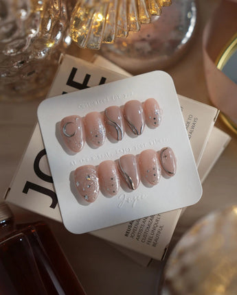 Starlight Rain nails in extra short almond — Champagne Nude Pink &
