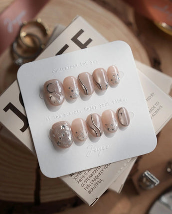 Starlight Rain nails in extra short oval — Champagne Nude Pink &