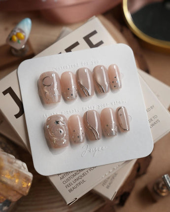 Starlight Rain nails in short coffin — Champagne Nude Pink &