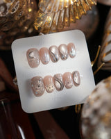Starlight Rain nails in short oval — Champagne Nude Pink &