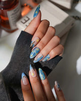 Starry Night custom size press-on nails in medium almond with hand-painted Van Gogh art