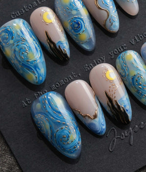 Starry Night press on nails hand-painted in blue and gold, inspired by Van Gogh