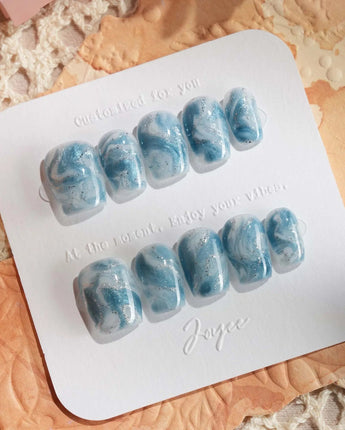 Starry River extra short coffin nails with blue-white flowing marble and calm gel shine