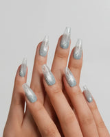 Still Water medium coffin press-on nails with dewy mint jelly texture