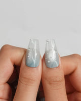 Still Water minimalist mint jelly nails with glossy water droplet details