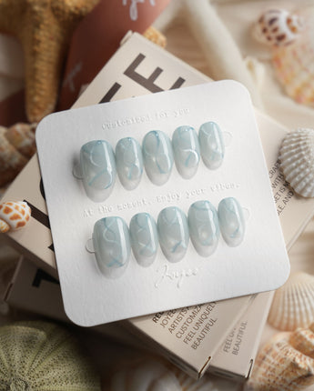 Still Water extra short oval press-on nails with dewy water bead texture