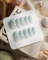 Still Water short coffin press-on nails with clean mint jelly and gel ribbons