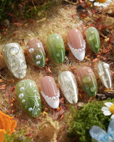 Streams - Journey Lines handmade press-on nails featuring Fresh Herbal Green, French Pearls & Metallic Texture.