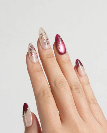 Sugar Thorn press-on nails with classic rose red gel and dimensional metallic rose details