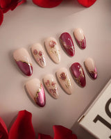 Sugar Thorn nail art close-up showing Classic Rose Red, 3D Metallic Rose Reliefs & Contrast French Tips. details