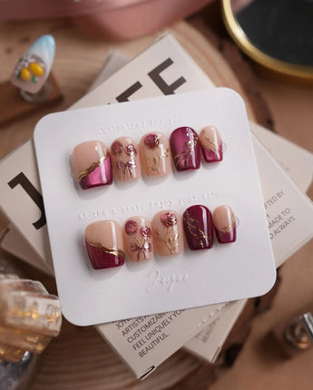 Sugar Thorn extra short coffin press-on nails with rose red French tips and metallic roses