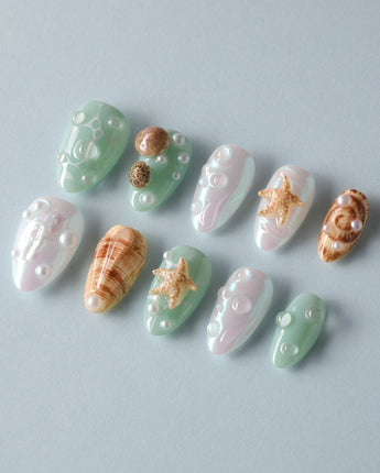 Mauritius Escape summer nail set with pearly mint, shell texture, bubbles, and starfish