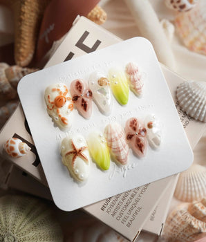Sun Fossil beach nail set with sculpted crabs, starfish and sand dollar details