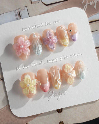 Sunbathing poolside nails with soft macaron pastels and sheer chrome finish