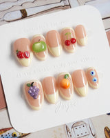 Sunny Mix press-on nails with citrus, peach and berry-inspired summer details