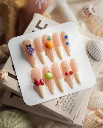 Sunny Mix long stiletto press-on nails with pastel fruit French tip design