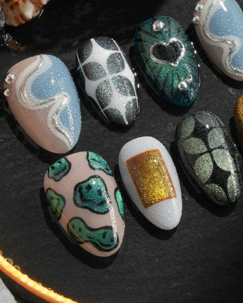 Mindbend handmade press-on nails featuring Cool & Earthy Tones, 3D Chrome & Abstract Retro.