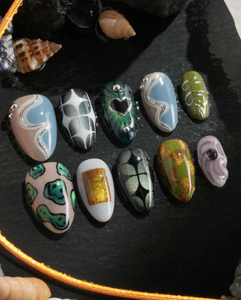 Mindbend close-up of heart accent, distorted shapes, and playful surreal nail art