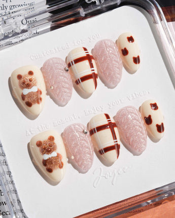 Sweater Weather press-on nails in extra short almond shape — Soft Brown Tone, 3D Bears & Knit Texture.