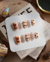 Sweater Weather press-on nails in extra short oval shape — Soft Brown Tone, 3D Bears & Knit Texture.