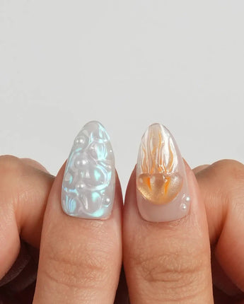 Tangerine Dream custom press-on nails with golden-hour coral and sea glass tones