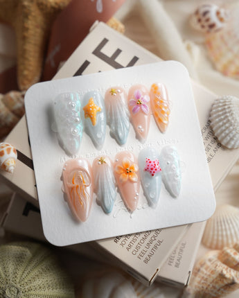 Tangerine Dream coral tropical press-on nails in medium stiletto shape