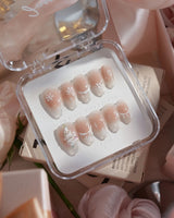 Thawing Crystal nails in short almond — Icy Nude Pink &