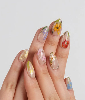 The Botanist handmade press-on nails featuring Vibrant Secret Garden, Multi-colored Hand-painted Florals & Metallic Edging.