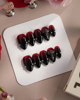 The Curse press-on nails — red to black gradient glossy chrome studs gothic cross charm handmade nail art by Joyee Nails