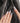 The Cygnus nail art close-up showing silver lilac cat eye feather chrome rhinestone cat eye effect details