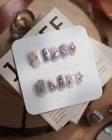 The Cygnus press-on nails — silver lilac cat eye feather chrome rhinestone cat eye effect handmade nail art by Joyee Nails