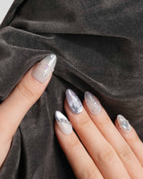 The Cygnus press-on nails — silver lilac cat eye feather chrome rhinestone cat eye effect handmade nail art by Joyee Nails