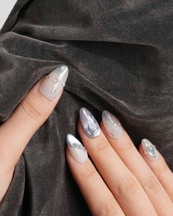 The Cygnus press-on nails — silver lilac cat eye feather chrome rhinestone cat eye effect handmade nail art by Joyee Nails