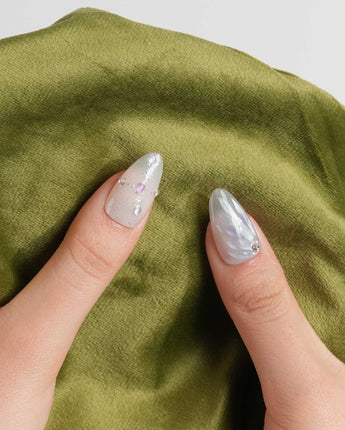 The Cygnus press-on nails — silver lilac cat eye feather chrome rhinestone cat eye effect handmade nail art by Joyee Nails