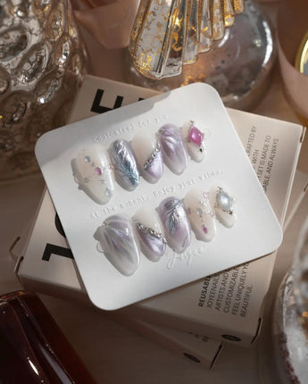 The Cygnus press-on nails — silver lilac cat eye