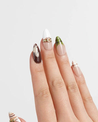 THE HEIR medium almond press-on nails with British equestrian plaid and gold horsebit details