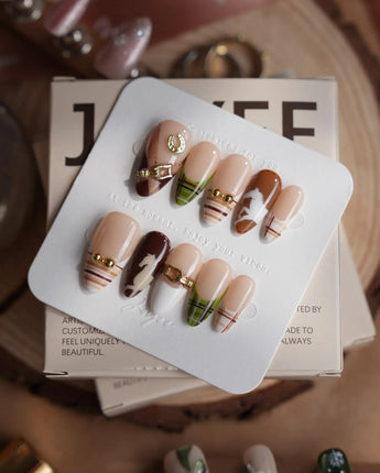 THE HEIR medium almond press-on nails with equestrian silhouettes and plaid fall styling