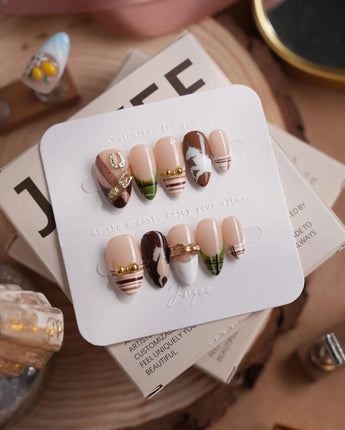 THE HEIR extra short almond press-on nails with plaid, horse silhouettes and metallic details