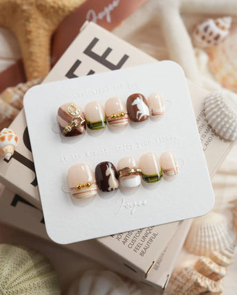 THE HEIR extra short squoval press-on nails with vintage plaid and metallic horsebit accents