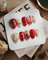 THE LEGEND nails in extra short almond — Vibrant Red & Creamy