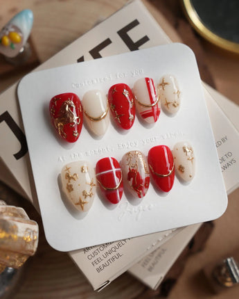 THE LEGEND nails in extra short almond — Vibrant Red & Creamy