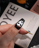 The Phantom handmade press-on nails in medium coffin shape by Joyee Nails